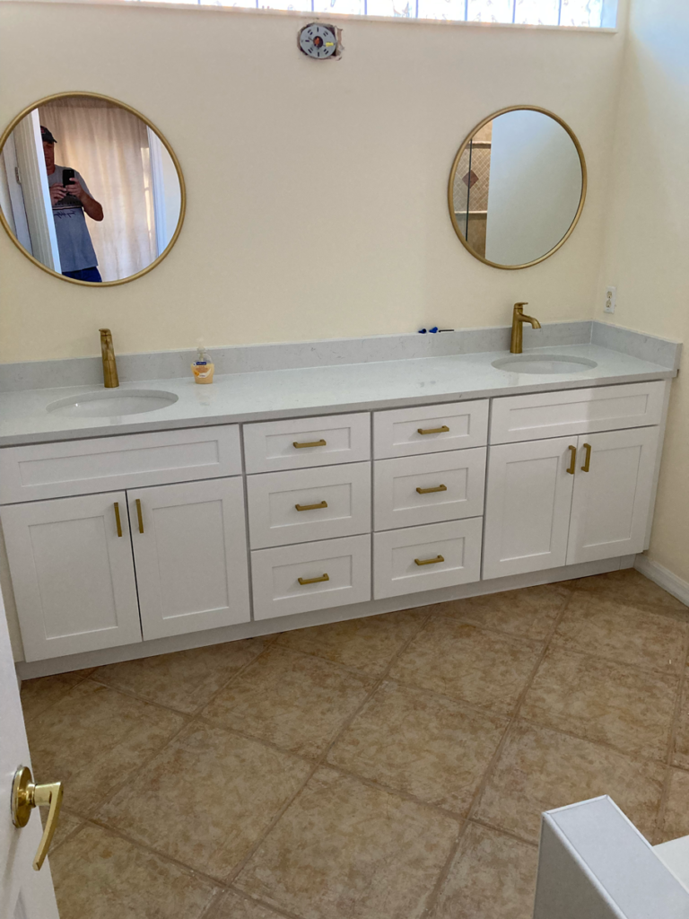 Standing Shower with Circle Mirrors in Remodeled Bathroom | Gallery Showcase